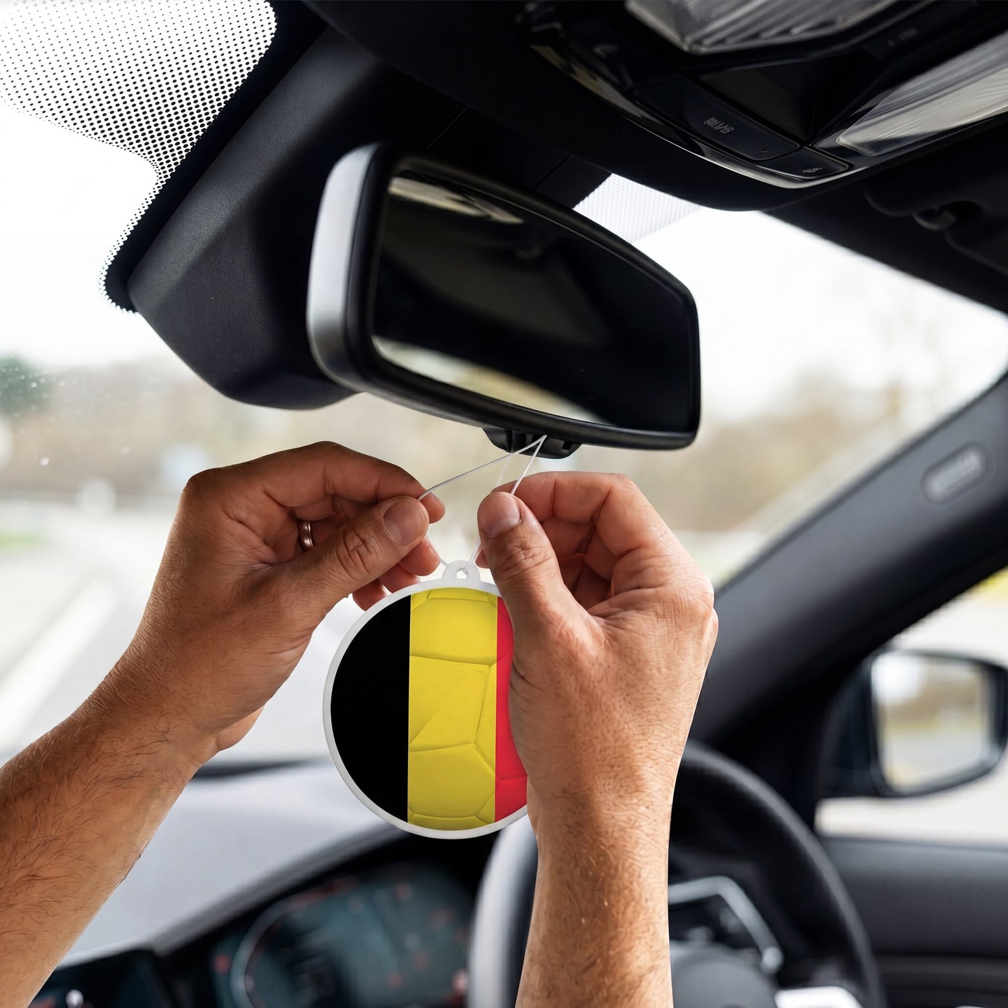 Belgium flag car freshener hanging on rearview mirror