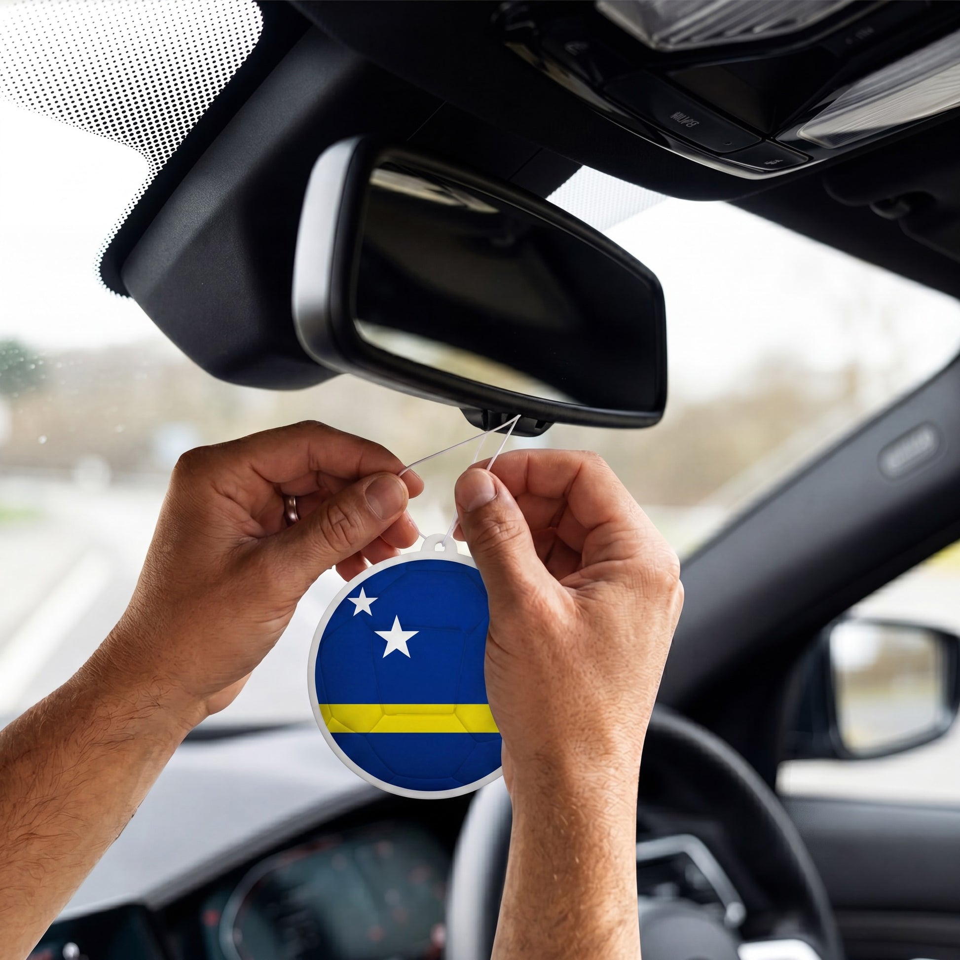 Curacao flag car freshener hanging on rearview mirror