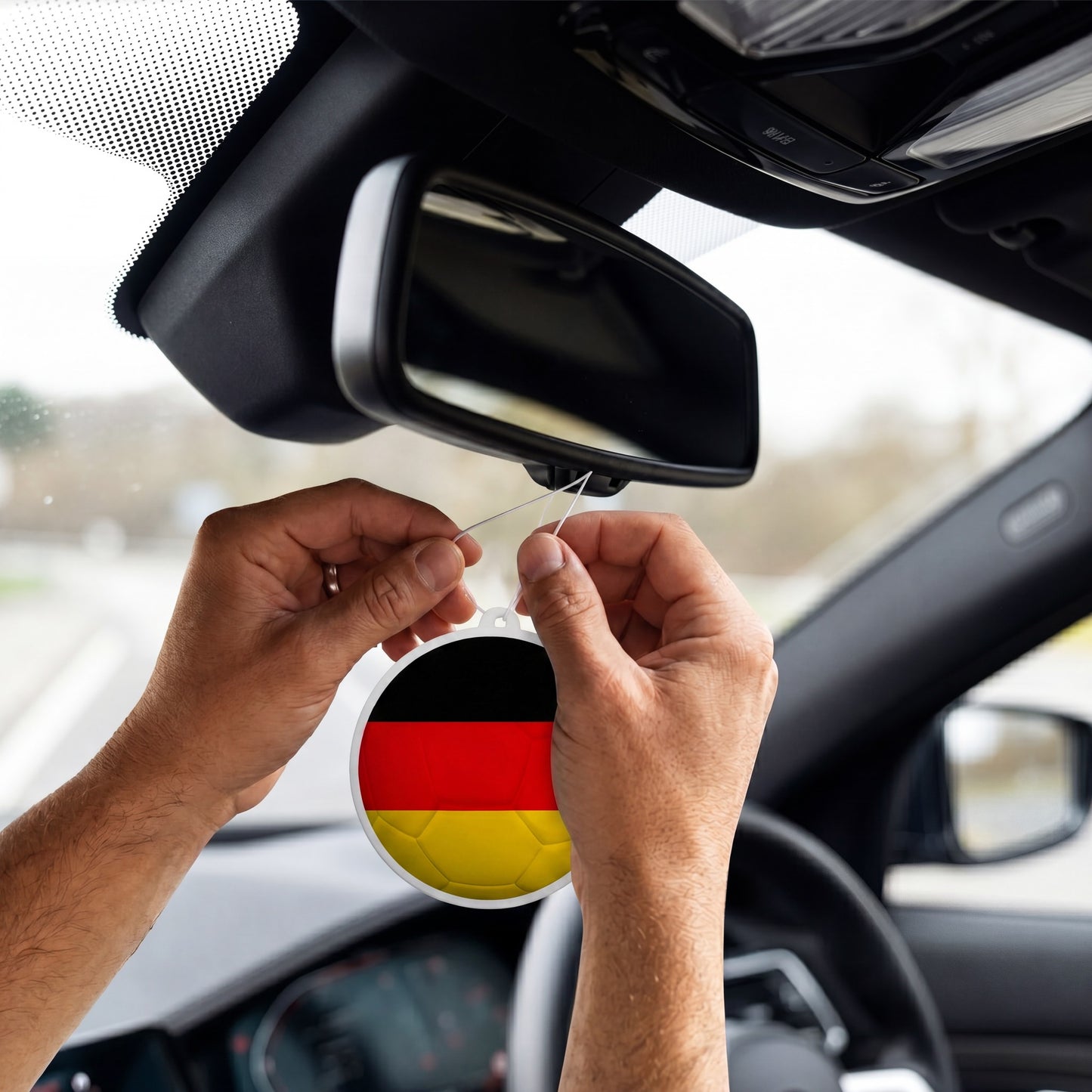 Germany flag car freshener hanging on rearview mirror